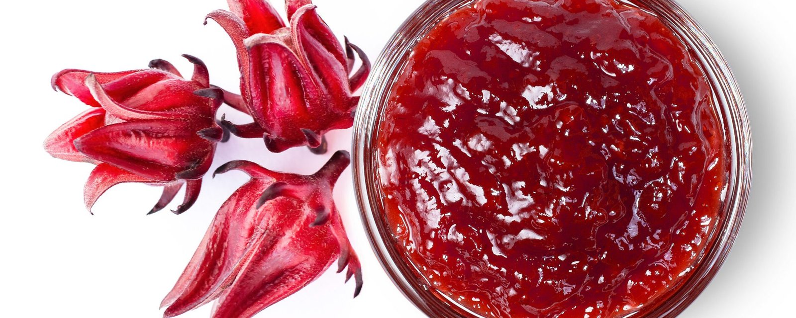 Roselle jam in glass jar and fresh Roselle flower (Jamaica sorrel, Rozelle or hibiscus sabdariffa) isolated on white background. Top view.